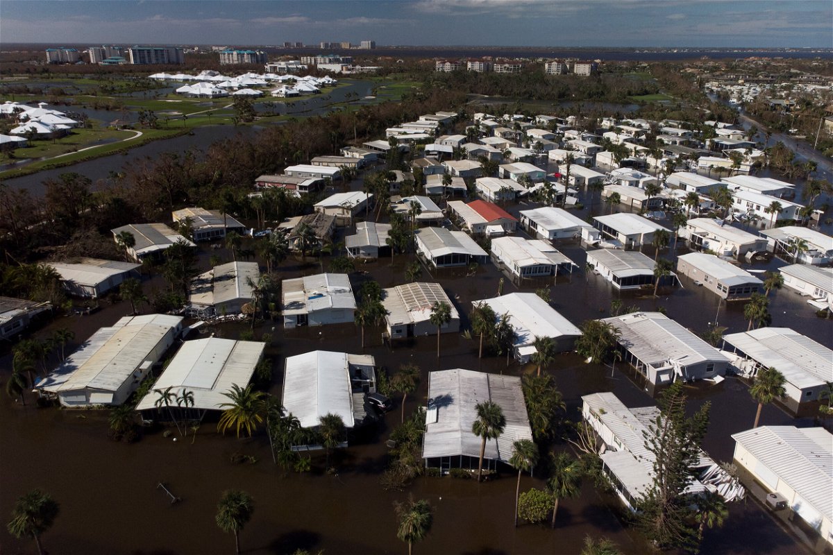 <i>Marco Bello/Reuters</i><br/>A flooded community in Fort Myers