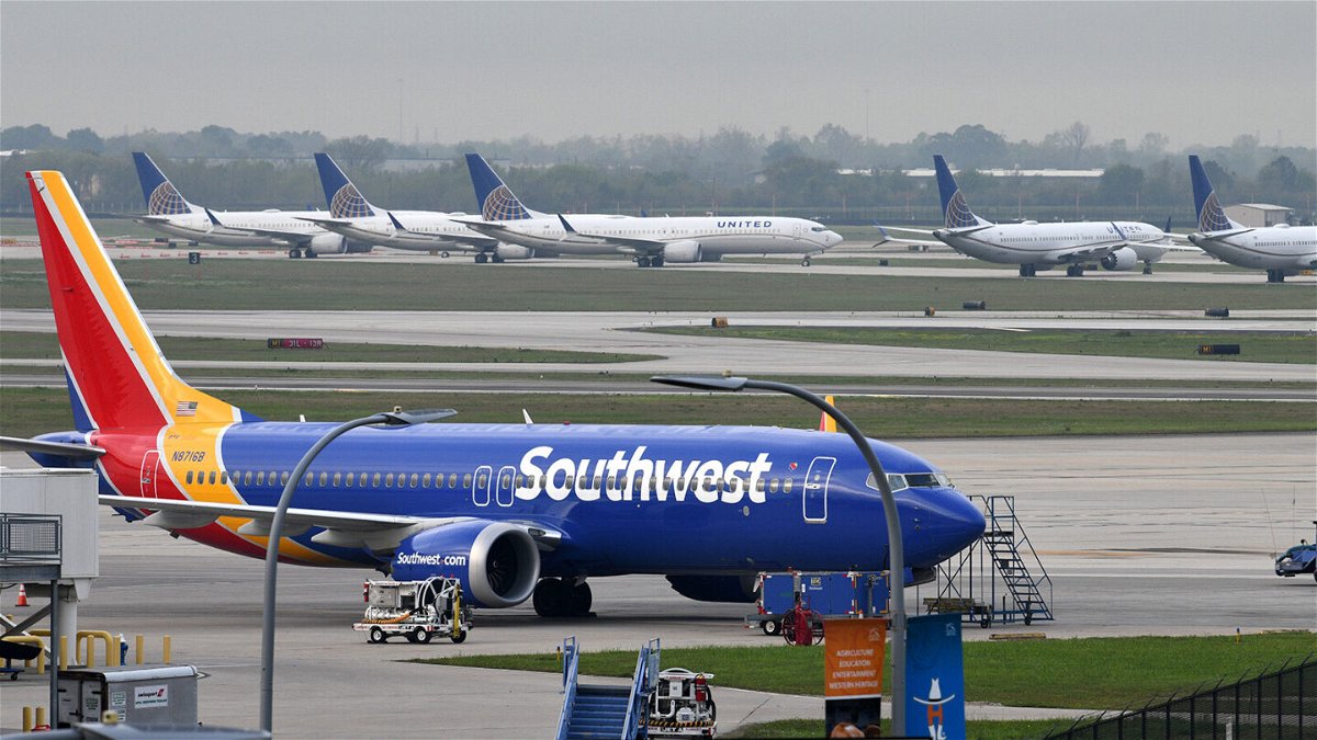 <i>Loren Elliott/Reuters</i><br/>The pilot of a Southwest Airlines flight threatened to cancel takeoff after someone on the plane sent a naked photograph to other passengers. A Southwest Airlines Boeing 737 MAX 8 is pictured in Houston in March of 2019.