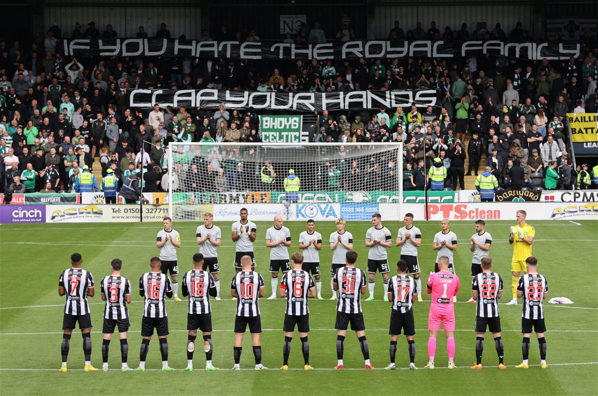 <i>Steve Welsh/PA Images/Getty Images</i><br/>Celtic fans held up banners during the minute's applause.