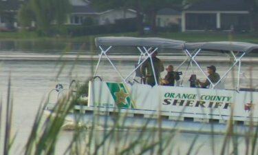 A second middle school student has died after a lightning strike may have caused the boat of a student rowing club to capsize earlier this month. Orange County Sheriff deputies are seen here on Lake Fairview in Orlando