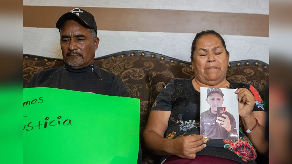 Napoleon Sepúlveda and Luz Maria Martinez of Durango, Mexico, recall the last days of their son, Jesús Sepúlveda, while they wait in Juárez for his body to be released on Tuesday, Oct. 4.