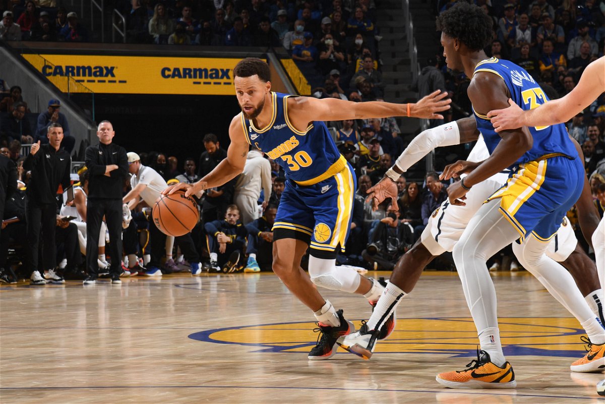 <i>Noah Graham/NBAE/Getty Images</i><br/>Steph Curry dribbles the ball against the Denver Nuggets at Chase Center in San Francisco