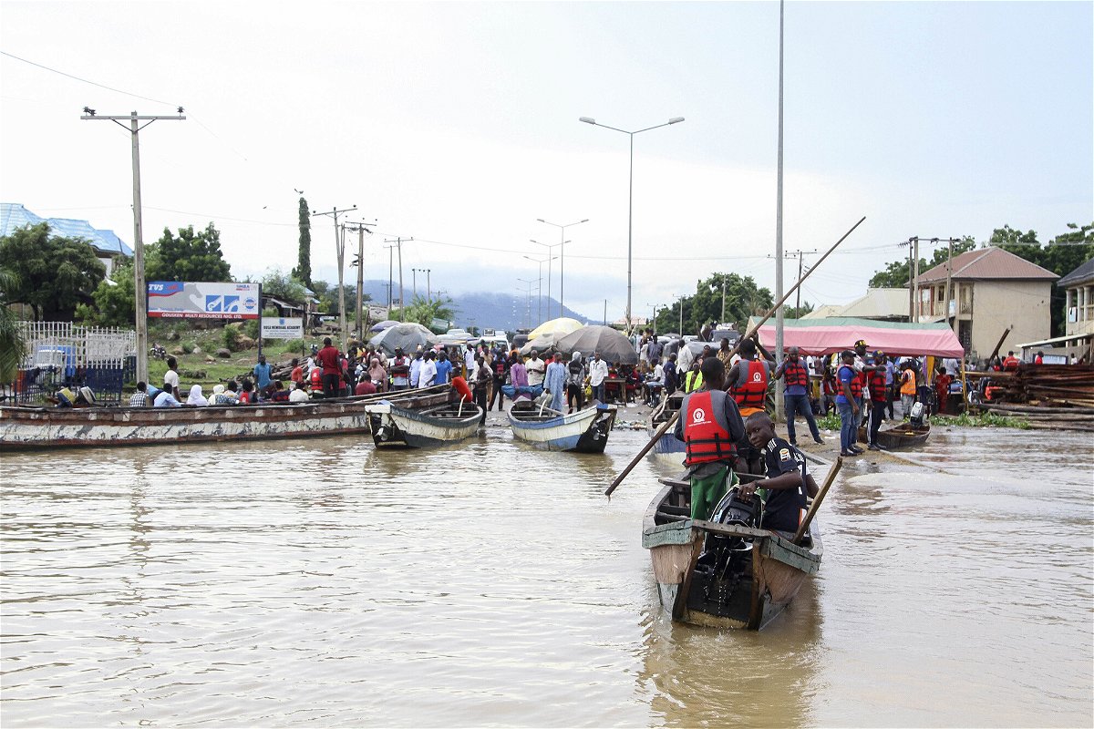 <i>Fatai Campbell/AP</i><br/>Floods in parts of Nigeria have killed hundreds and displaced more than 1 million people.