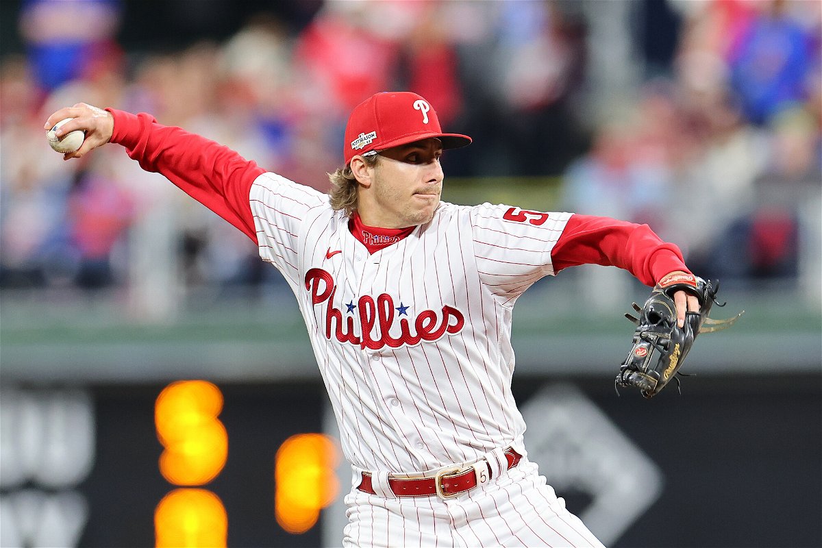 <i>Michael Reaves/Getty Images</i><br/>Bryson Stott of the Philadelphia Phillies throws out a runner at first base against the San Diego Padres in game four of the National League Championship Series at Citizens Bank Park on October 22.
