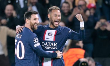 Messi and Neymar celebrate PSG's third goal in a dominant display against Israeli side Maccabi Haifa.