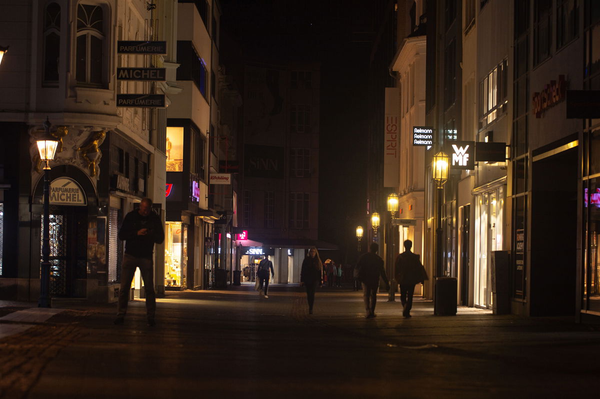 <i>Ying Tang/NurPhoto/Shutterstock</i><br/>The global economic outlook is darkening and the risks of recession are quickly rising. Dimmed lights are seen here in the city center of Bonn