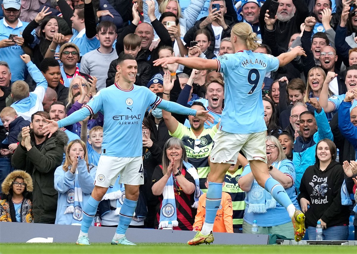 <i>Andrew Yates/CSM/ZUMA/AP</i><br/>Phil Foden of Manchester City celebrates scoring their sixth goal and also his hat trick with fellow hat trick scorer Erling Haaland of Manchester Cityduring the Premier League match at the Etihad Stadium