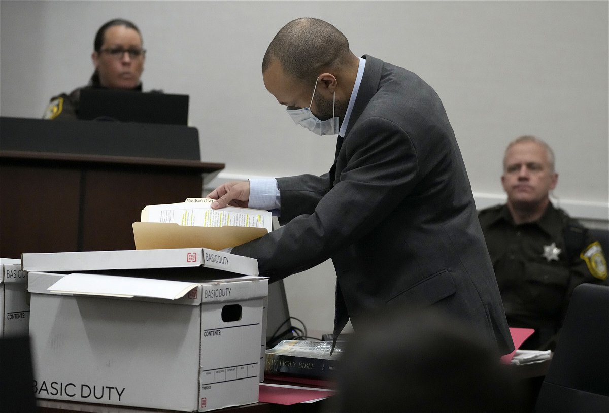 <i>Mike De Sisti/AP</i><br/>Darrell Brooks looks through files during the his trial in Waukesha County Circuit Court in Waukesha