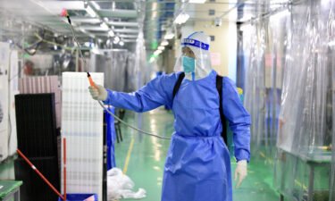 The bonuses are part of a recruitment drive aimed at getting iPhone production back on track at the Foxconn plant after a Covid lockdown. A staff member disinfects a factory on November 6 in Zhengzhou
