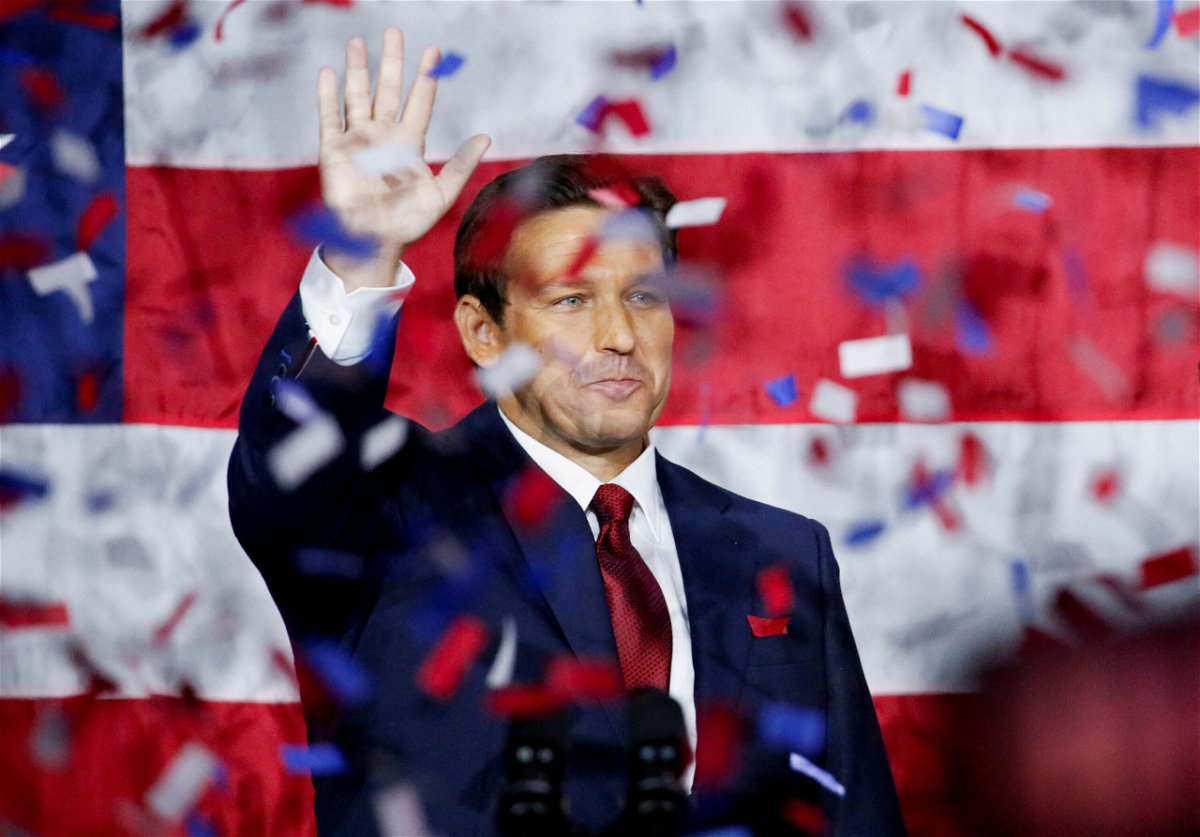 <i>Marco Bello/Reuters</i><br/>Republican Florida Governor Ron DeSantis celebrates onstage during his 2022 midterm elections night party in Tampa