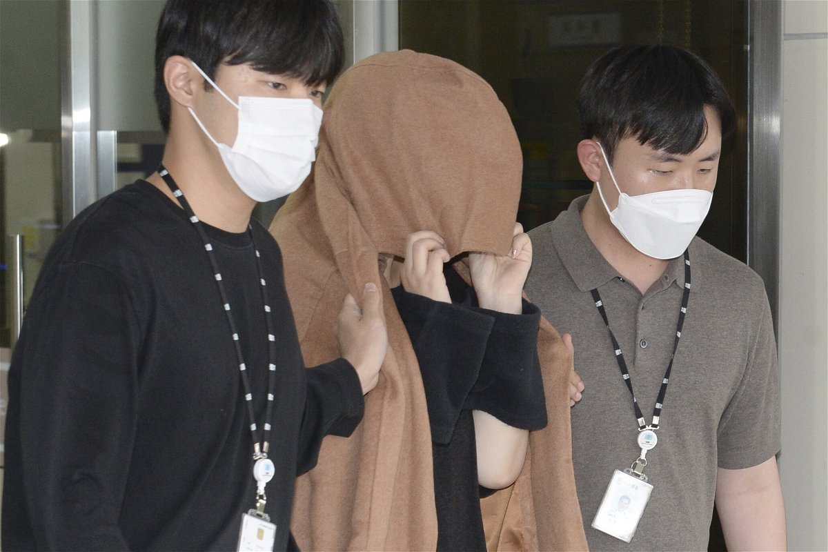 A woman leaves the Seoul Central District Prosecutors' Office in Ulsan