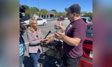 Jason Fekete talks about the price of groceries as he unloads his shopping cart in Virginia Beach