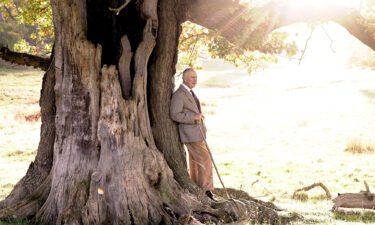 King Charles III with an ancient oak tree in Windsor Great Park to mark his appointment as Ranger of the Park.