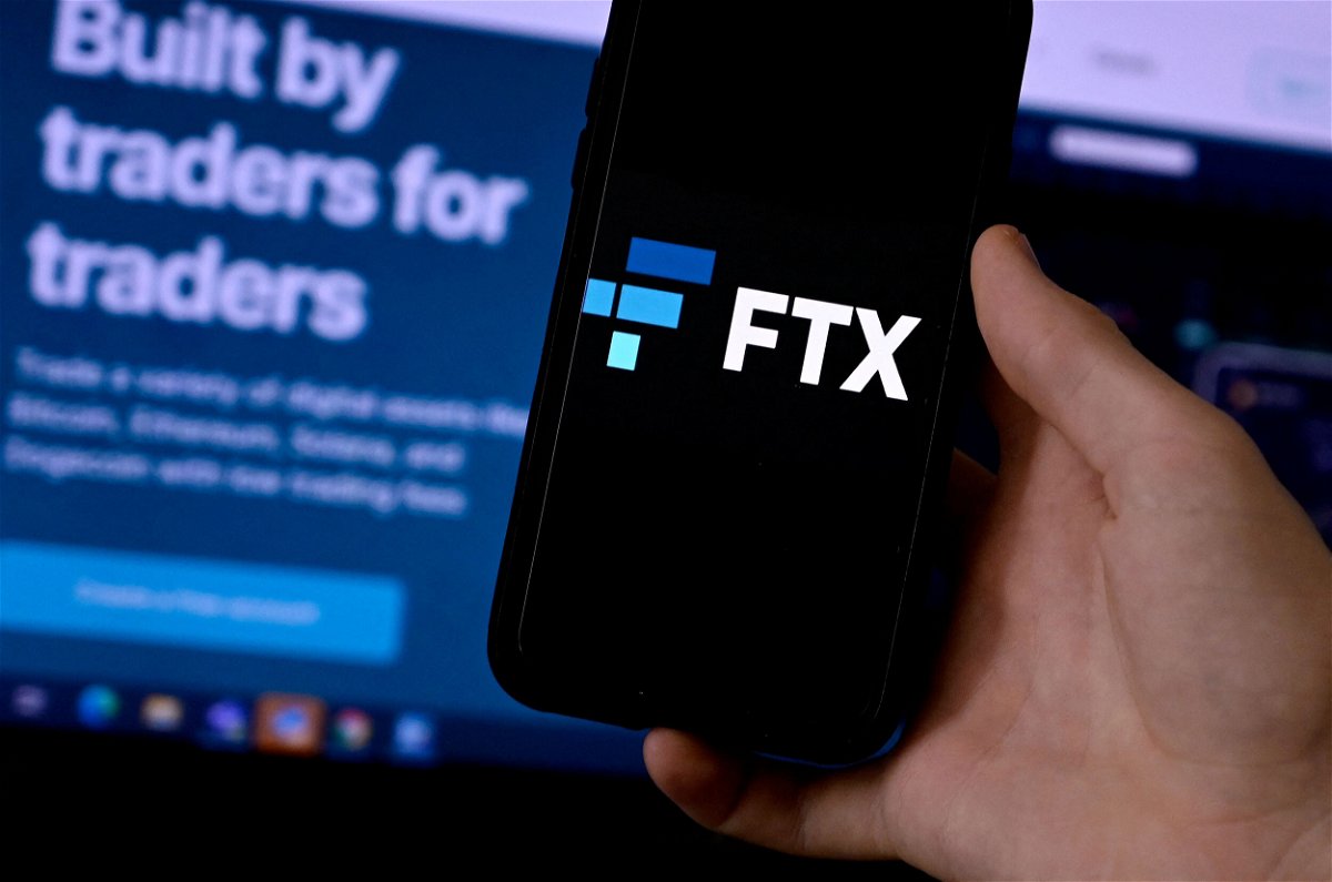 <i>Olivier Douliery/AFP/Getty Images</i><br/>Bitcoin has plummeted about 65% so far this year. This photo shows the logo of FTX with a screen showing their website in the background in Arlington