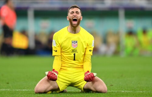 The US Men's National Team (USMNT) advanced to the World Cup knockout stage after its victory over Iran on November 29. USA goalkeeper Matt Turner is seen here celebrating Christian Pulisic's winning goal.