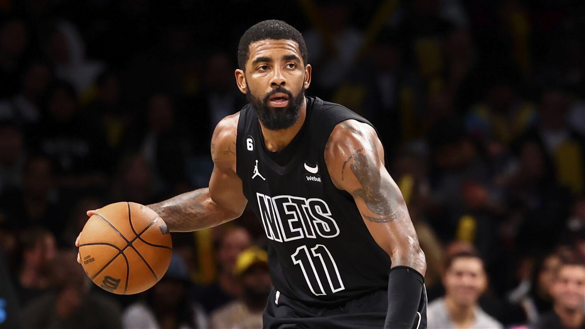 Brooklyn Nets guard Kyrie Irving (11) dribbles against the Indiana Pacers during the second half of an NBA basketball game Monday, Oct. 31, 2022, in New York. (AP Photo/Jessie Alcheh)