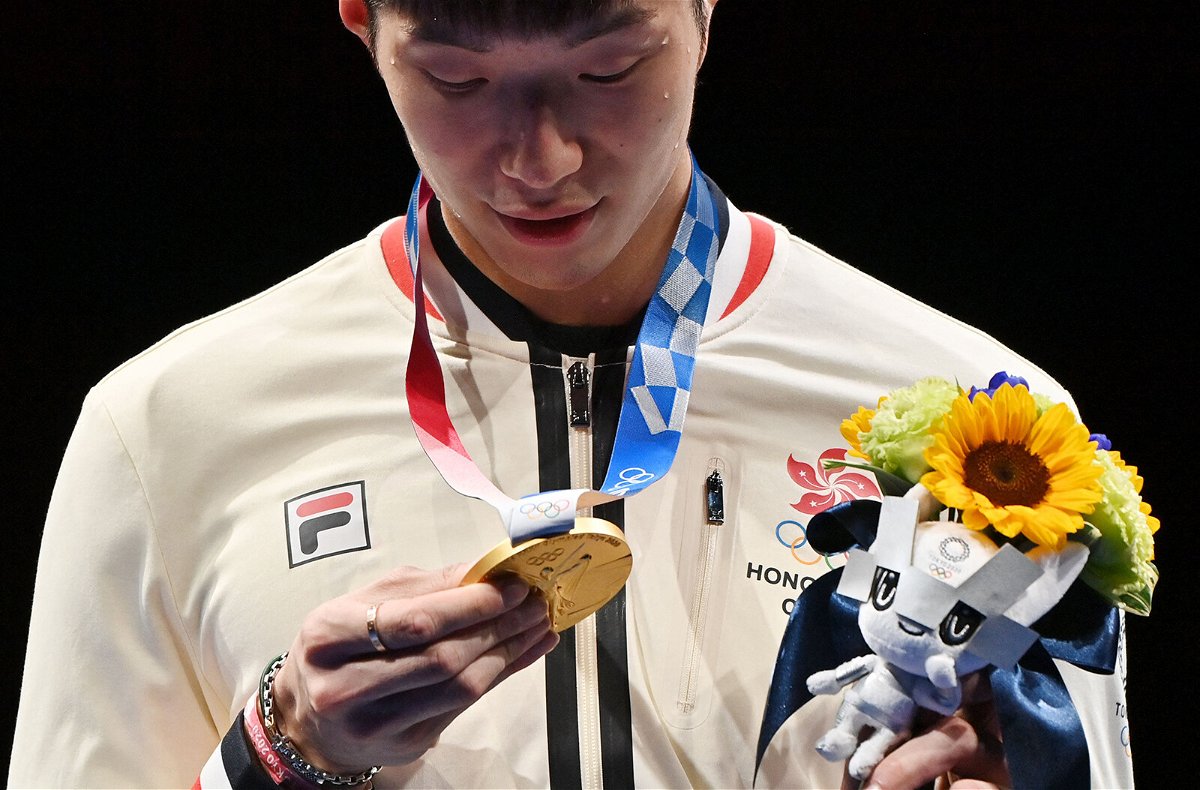<i>Fabrice Coffrini/AFP/Getty Images</i><br/>Hong Kong's Edgar Cheung received the gold medal for the men's individual foil on July 26