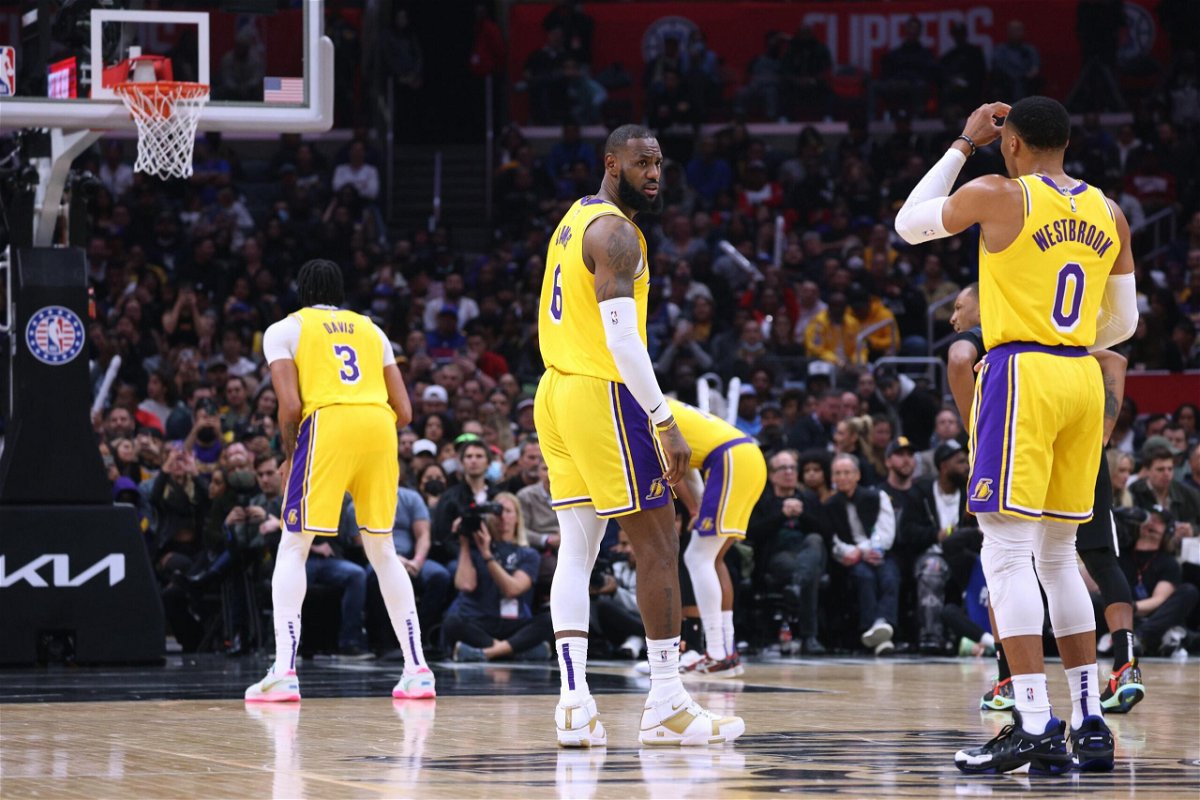 <i>Harry How/Getty Images North America/Getty Images</i><br/>LeBron James (center) was in good form before coming off the court injured in the fourth quarter.