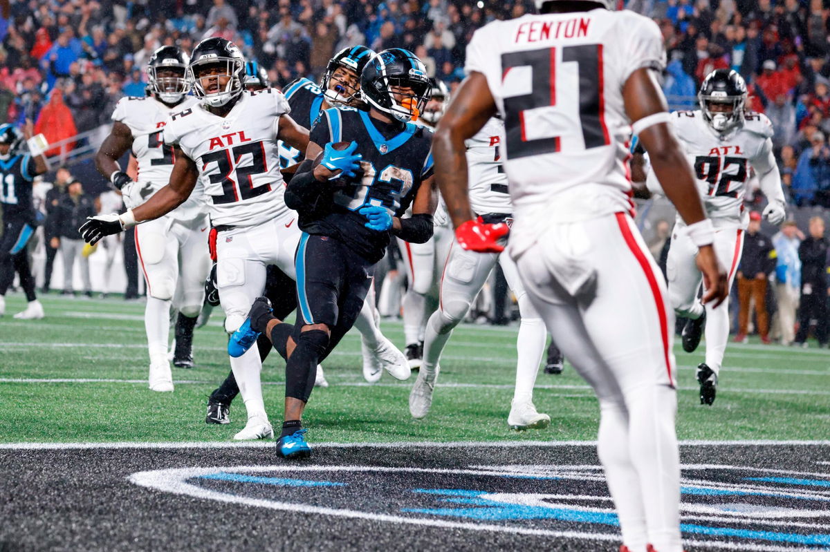 <i>Lance King/Getty Images</i><br/>D'Onta Foreman (center) scores a touchdown during the third quarter against the Falcons on November 10.