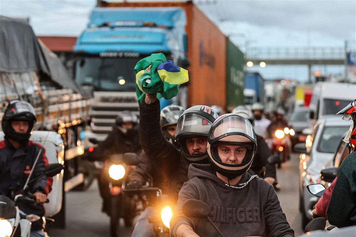 <i>Anderson Coelho/AFP/Getty Images</i><br/>Supporters of President Jair Bolsonaro block the BR-101 highway in Palhoca