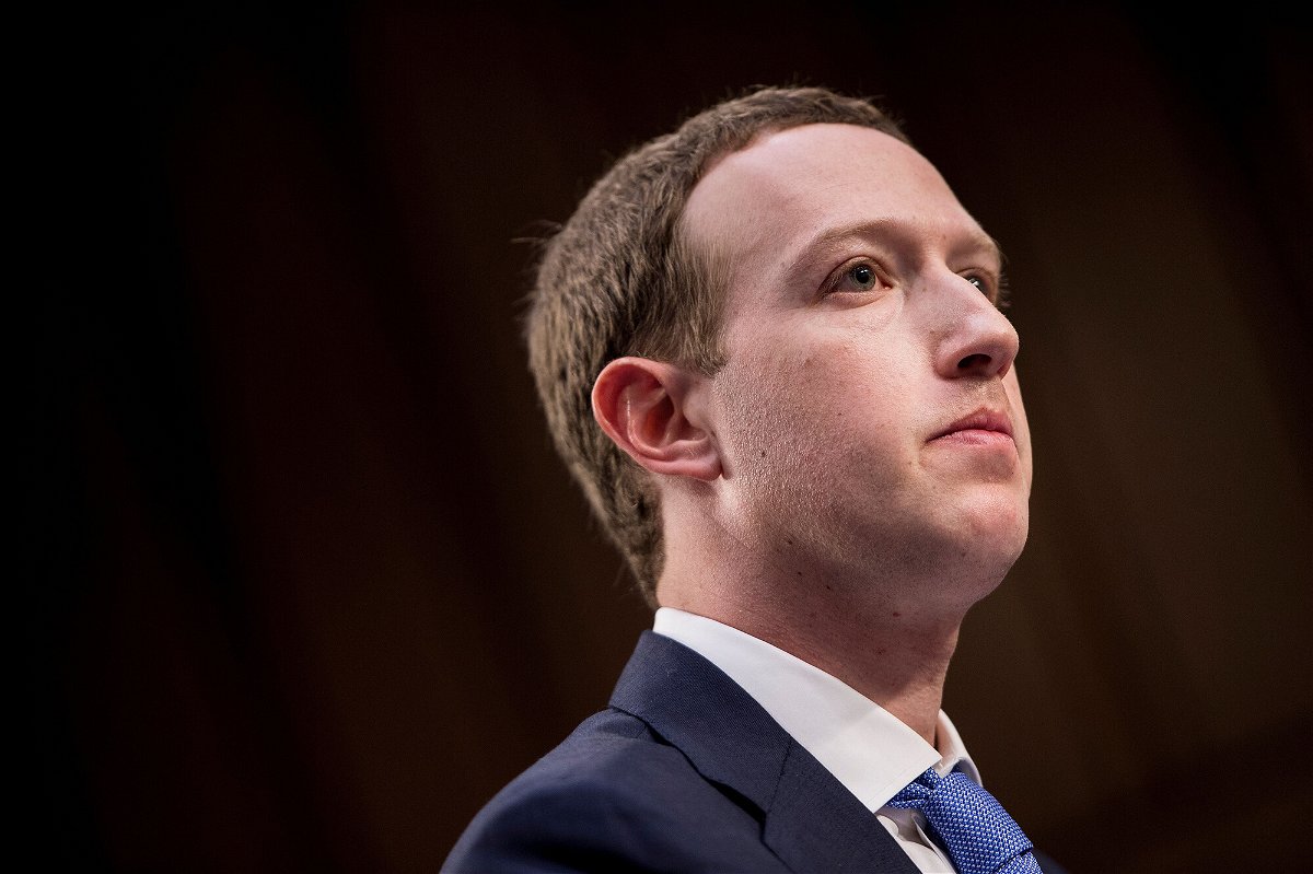 <i>Brendan Smialowski/AFP/Getty Images</i><br/>Facebook-parent Meta is said to be planning the first significant layoffs in its history as the company grapples with a shrinking business and fears of a looming recession. CEO Mark Zuckerberg is seen here on Capitol Hill in April of 2018.