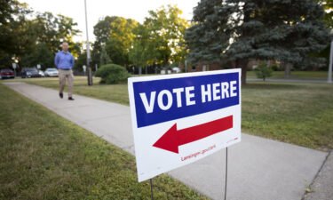 A voter arrives at a polling location to cast his ballot in the Michigan Primary Election on August 2 in Lansing