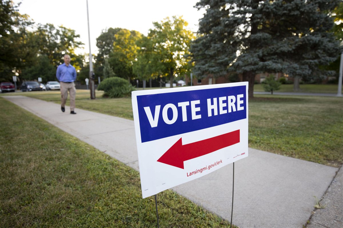 <i>Bill Pugliano/Getty Images</i><br/>A voter arrives at a polling location to cast his ballot in the Michigan Primary Election on August 2 in Lansing
