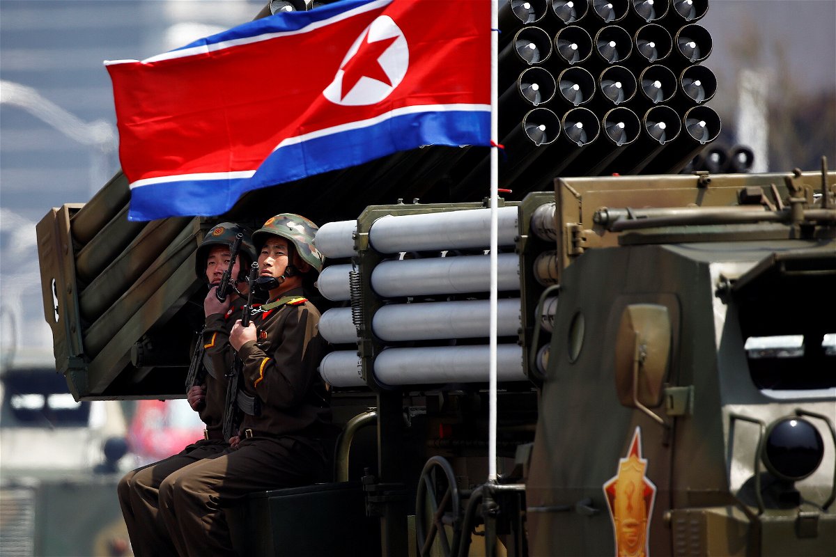 <i>Damir Sagolj/Reuters</i><br/>Soldiers hold weapons while seated on a vehicle carrying rockets in Pyongyang in April 2017. North Korea fired at least one unidentified ballistic missile on November 3.