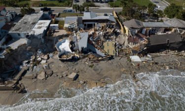 An aerial view of destroyed beachfront homes in the aftermath of Hurricane Nicole at Daytona Beach