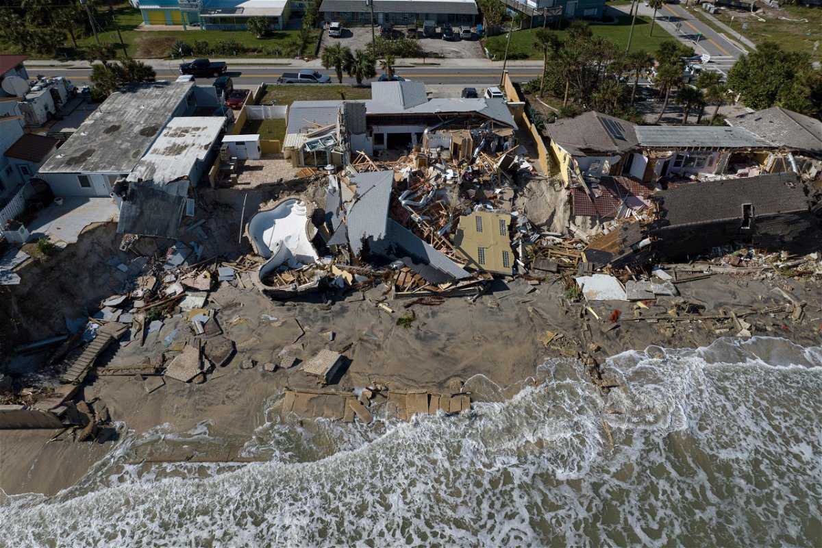 <i>Ricardo Arduengo/AFP/Getty Images</i><br/>An aerial view of destroyed beachfront homes in the aftermath of Hurricane Nicole at Daytona Beach