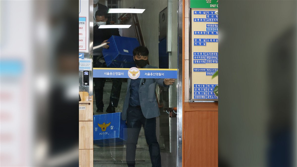 Members of the police special investigative headquarters leave Yongsan Police Station after a raid as part of a probe into the bungled police response to the deadly Itaewon crowd crush that claimed at least 156 lives in Seoul on November 2.