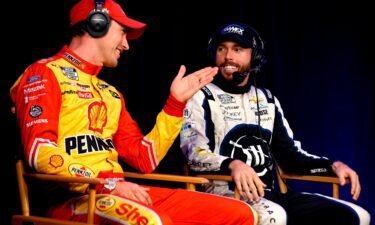 Joey Logano (left) and Ross Chastain talk during a roundtable discussion at the NASCAR Championship 4 Media Day at Phoenix Raceway on November 3