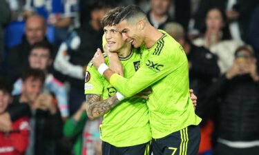 Garnacho celebrates with teammate Cristiano Ronaldo who provided the assist.
