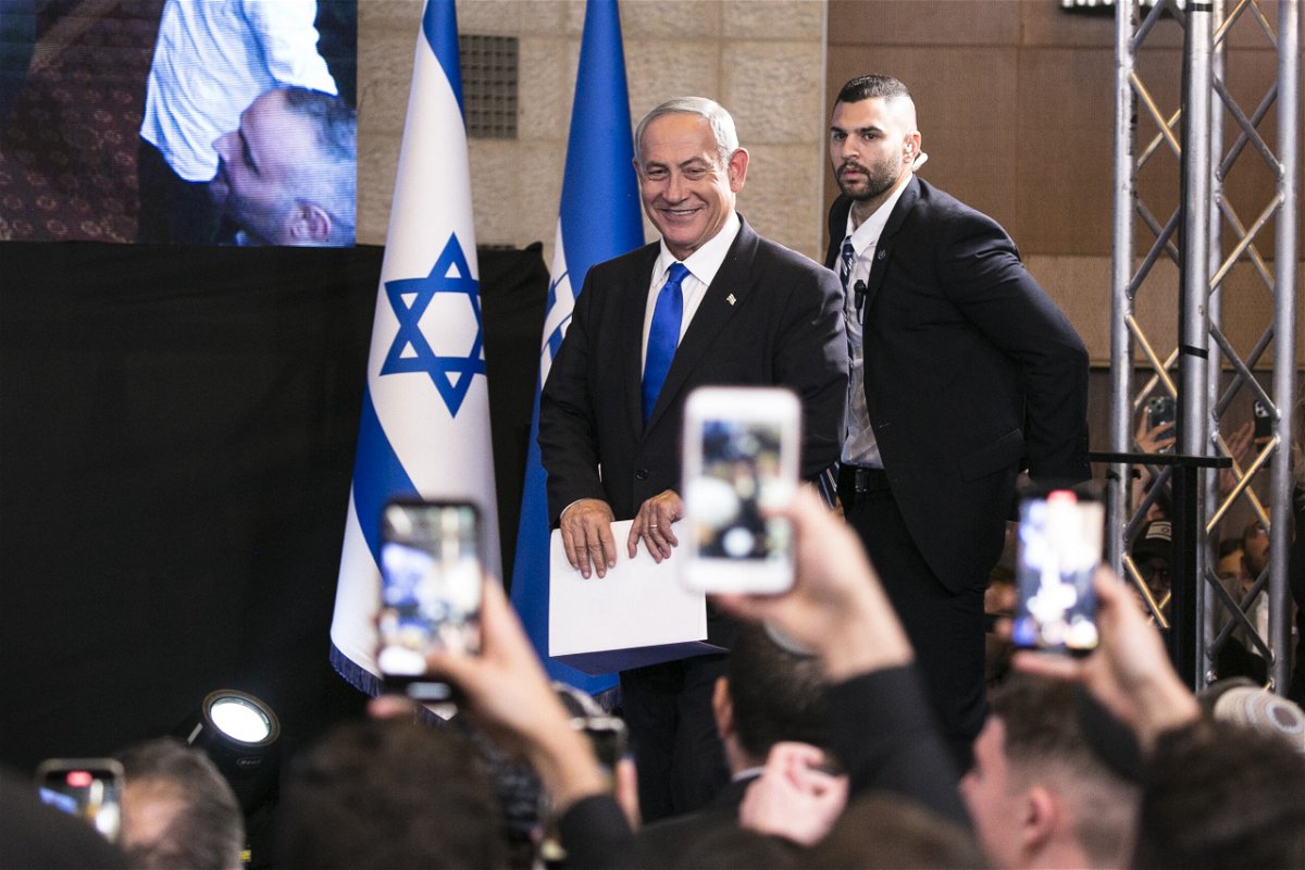 <i>Amir Levy/Getty Images</i><br/>Likud party leader Benjamin Netanyahu smiles as he enters an election night event for the Likud party on November 1