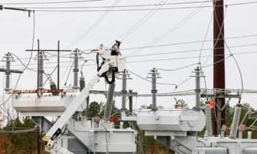 Duke Energy personnel work to restore power at a second crippled electrical substation after the Moore County Sheriff said that vandalism caused a mass power outage