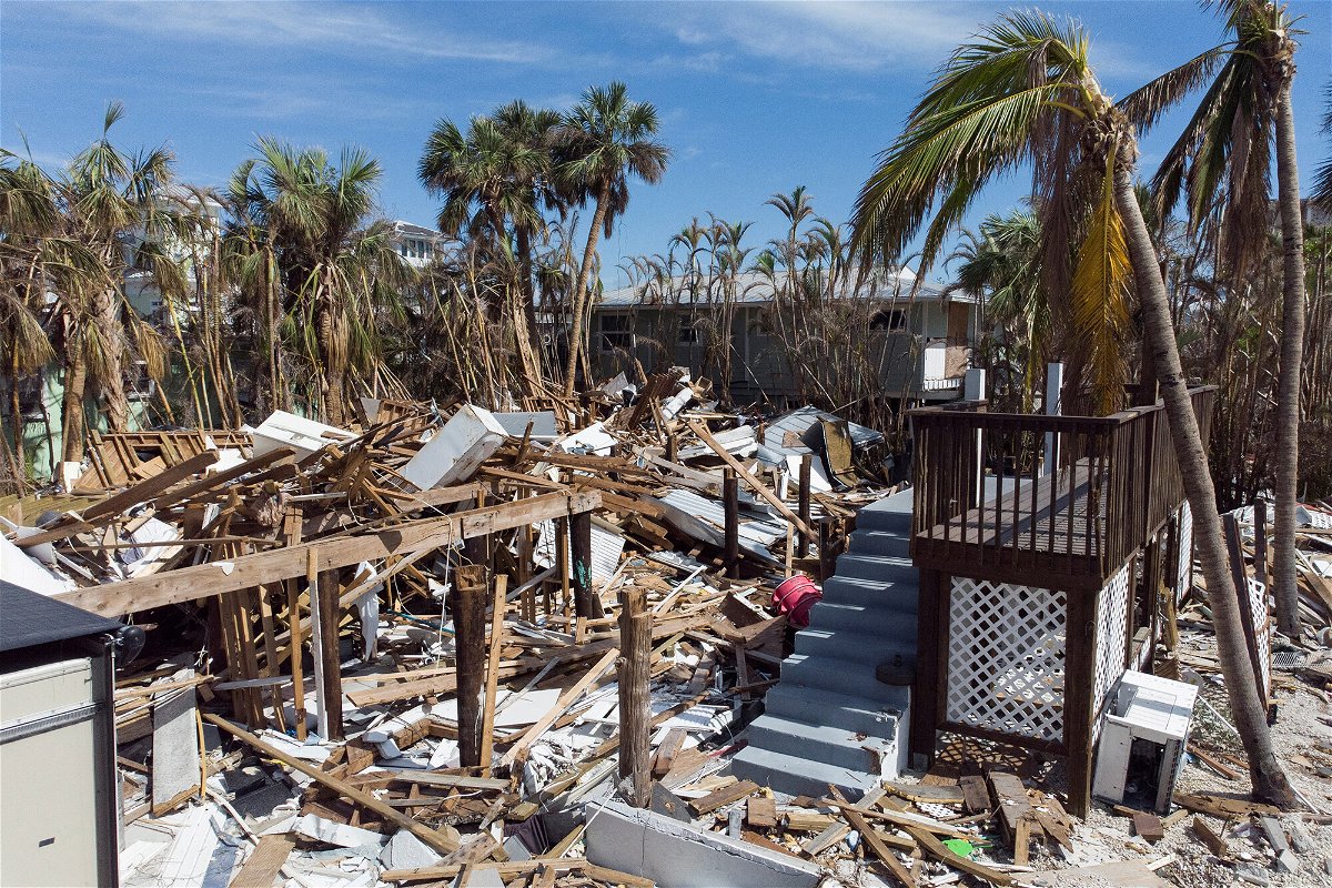 <i>Marco Bello/Reuters</i><br/>Remains of destroyed houses are seen almost one month after Hurricane Ian landfall in Fort Myers Beach