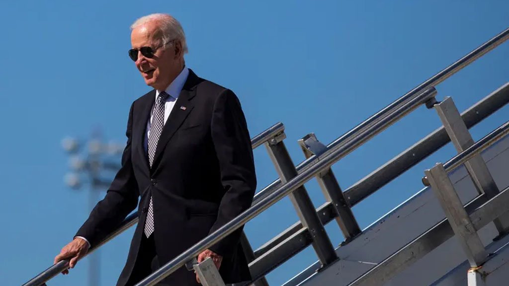 President Joe Biden descends from Air Force One at Stewart Air National Guard Base in New York on Oct. 6.