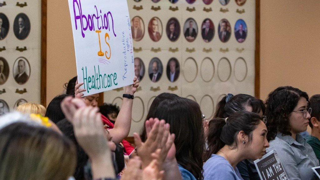 Abortion-rights supporters react to a public comment in favor of the proposal by city Reps. Alexsandra Annello and Henry Rivera to deprioritize abortion investigations in El Paso during a July 5, 2022 meeting. That proposal failed. A similar one passed today, Tuesday, Jan. 31.