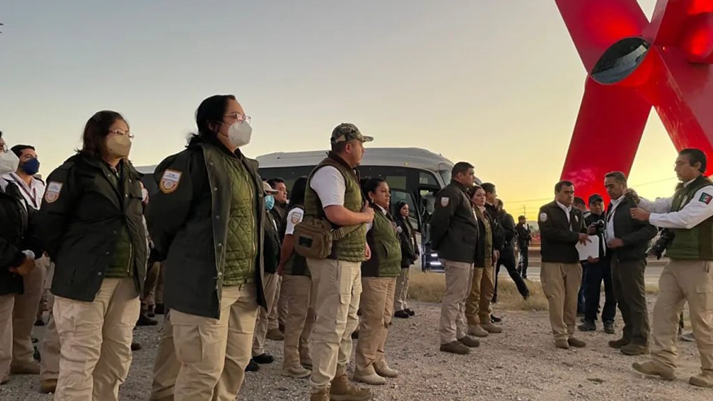 Federal agents with Mexico's National Institute of Migration prepare to patrol along the Rio Grande in Juarez on Friday.