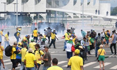 Supporters of former Brazilian President Jair Bolsonaro clash with police during a demonstration outside the Planalto Palace in Brasília on Sunday.