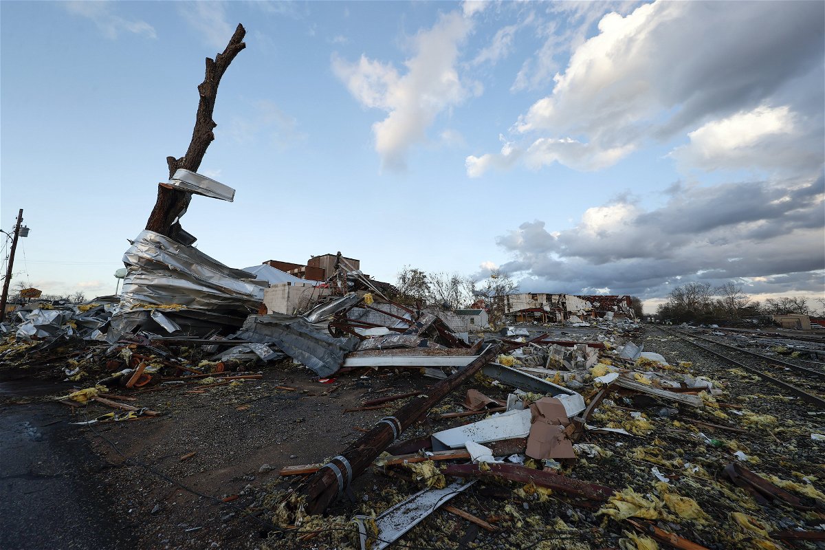 Damage from businesses hit by a tornado that went through downtown Selma is scattered on the ground, Thursday, Jan. 12, 2023 in Selma Ala. (AP Photo/Butch Dill)