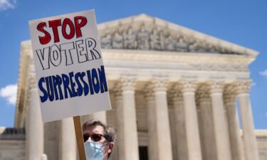 A federal appeals court on Wednesday is considering a 'radical' change to how voting rights are protected. Activists here rally outside the Supreme Court on June 23