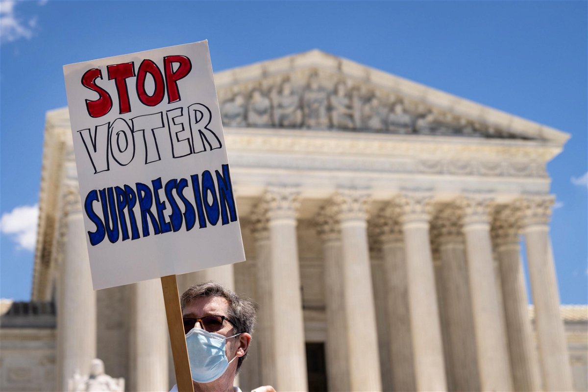 <i>Drew Angerer/Getty Images</i><br/>A federal appeals court on Wednesday is considering a 'radical' change to how voting rights are protected. Activists here rally outside the Supreme Court on June 23