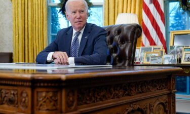 President Joe Biden participates in a briefing in the Oval Office of the White House