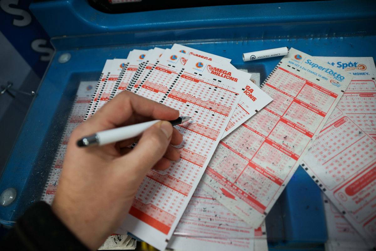 CALIFORNIA, USA - DECEMBER 23: A person plays Mega Millions lottery at a store in Burlingame, California, United States on December 23, 2022. Today's Mega Millions jackpot hits $510 million. (Photo by Tayfun Coskun/Anadolu Agency via Getty Images)