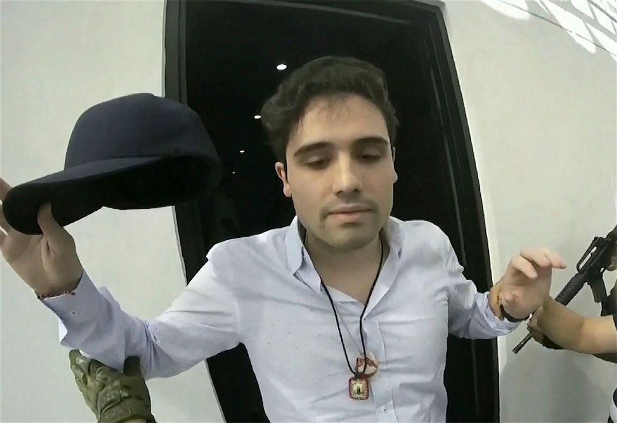File photo shows Ovidio Guzmán being arrested by Mexican authorities in October 2019.