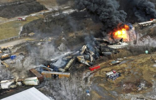 This photo taken with a drone shows portions of a Norfolk Southern freight train that derailed in East Palestine