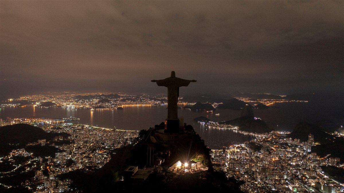 <i>Mauro Pimentel/AFP/Getty Images</i><br/>The statue of Christ the Redeemer is seen after being plunged into darkness for Earth Hour on March 26 in Rio de Janeiro