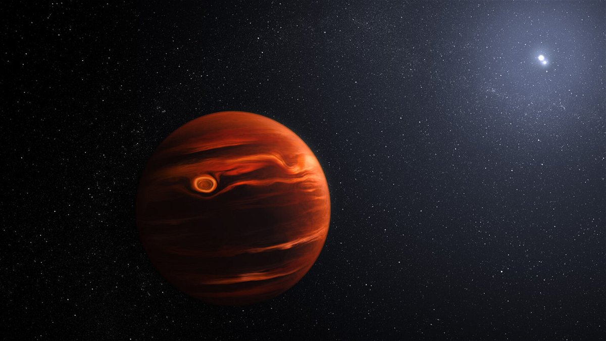 <i>NASA/ESA/CSA/Joseph Olmsted</i><br/>An illustration of exoplanet VHS 1256 b and its two stars.