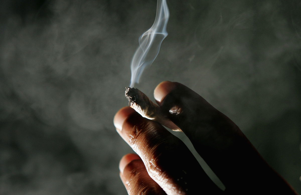 <i>Justin Sullivan/Getty Images</i><br/>Jonathan Beaver of San Francisco holds a marijuana cigarette at the San Francisco Patients Cooperative